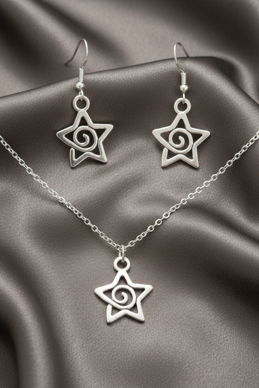 Schmuckset Sternspirale Edelstahl Kette und Ohrringe silber auf schwarzem Hintergrund
