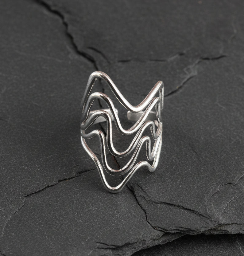 Skulpturaler Wellen Ring Edelstahl silberfarben größenverstellbar